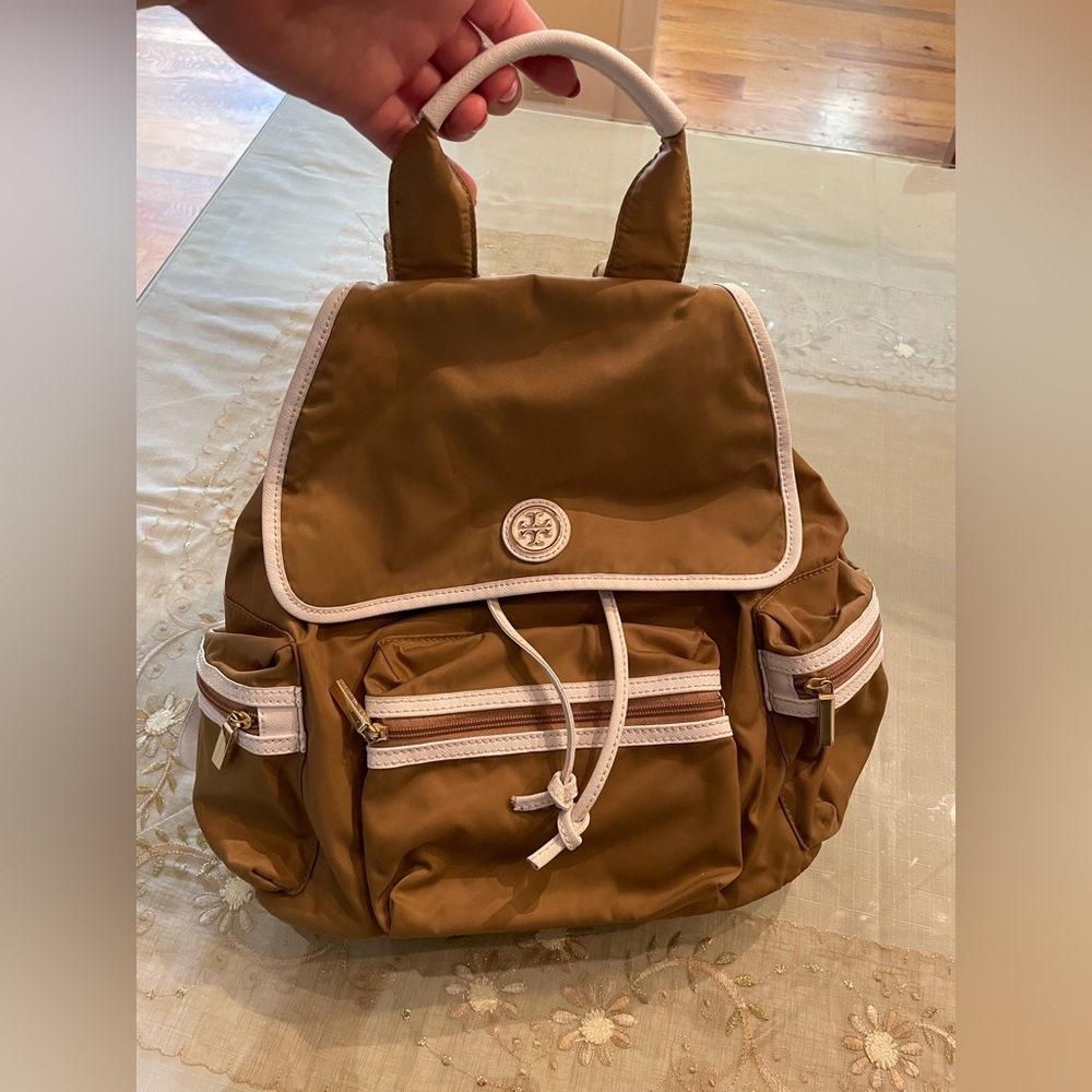 Tory burch camel colored small backpack with white trim
